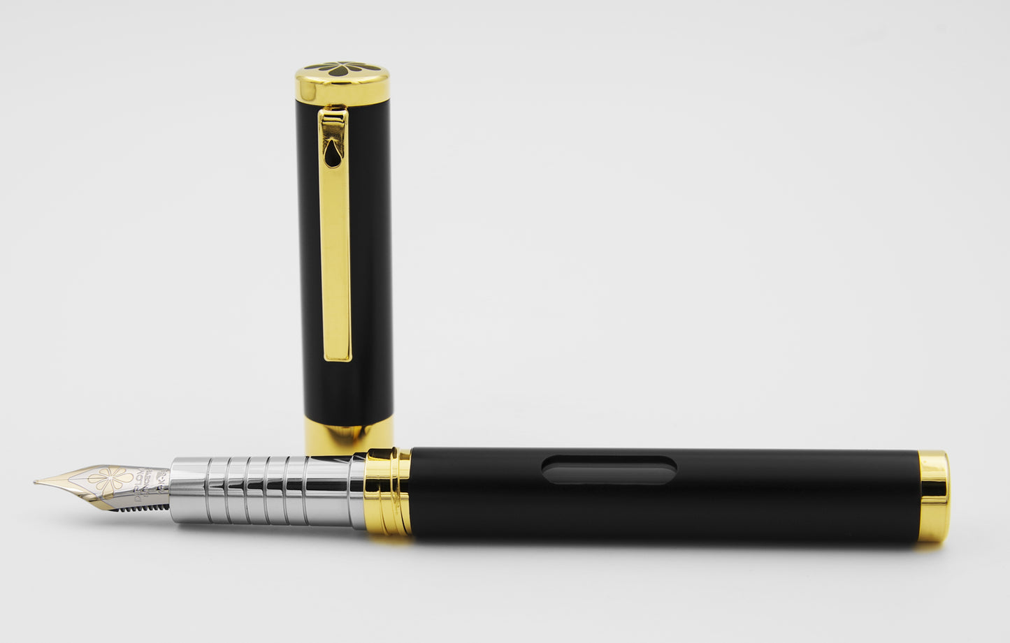 Diplomat Füllfederhalter NEXUS mit Tintenglas Schwarz/Gold 14k